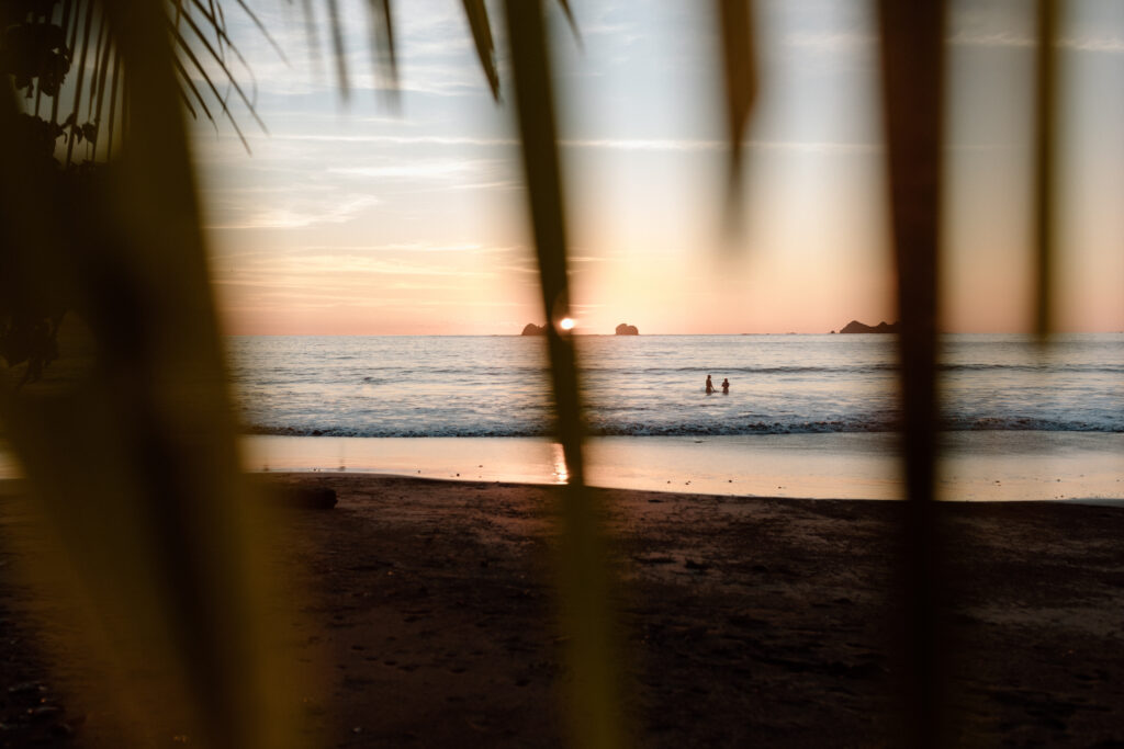 couple surfing beach couples photoshoot in uvita costa rica