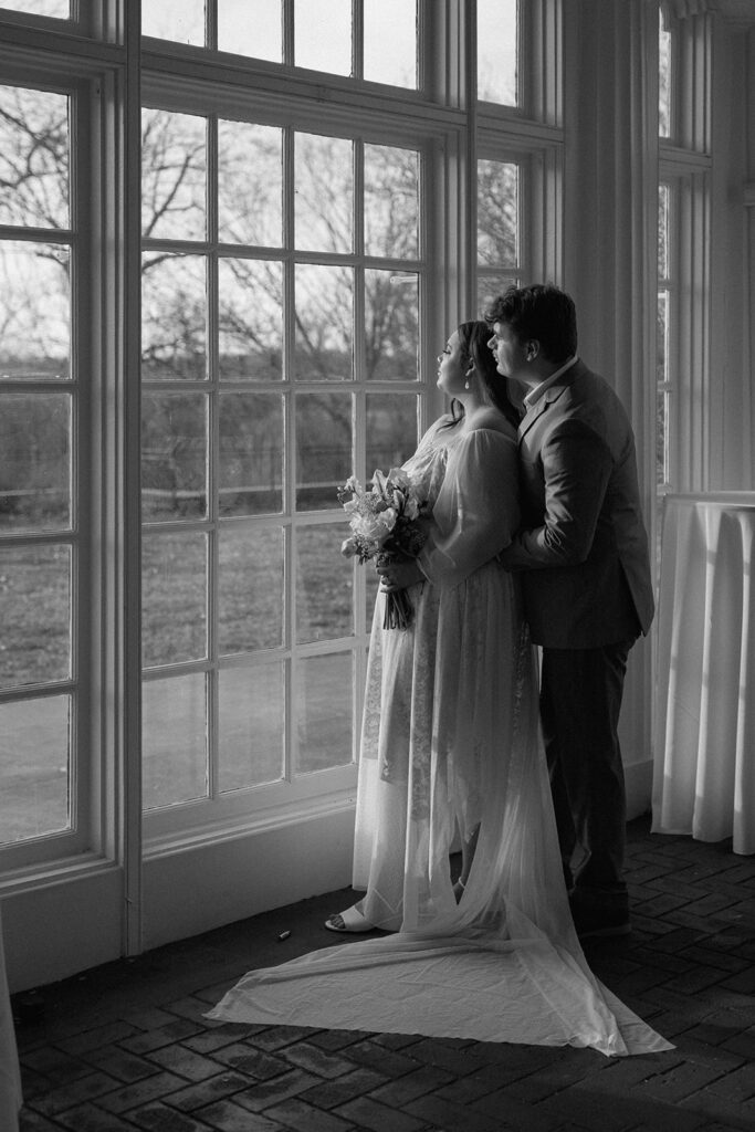 bride and groom indoor portraits for elegant estate wedding at longview mansion in Missouri
