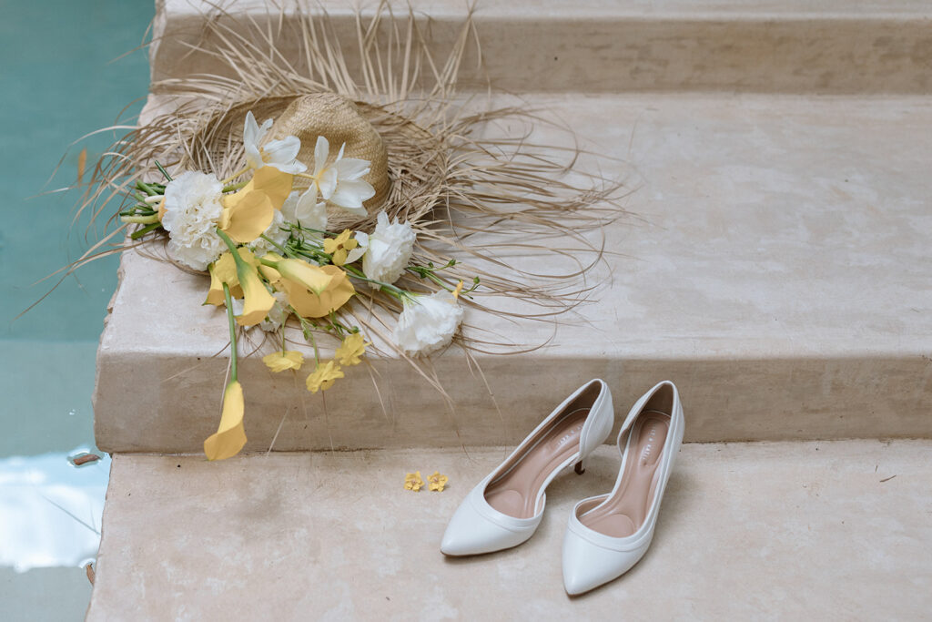 tropical elopement bouquet and shoes