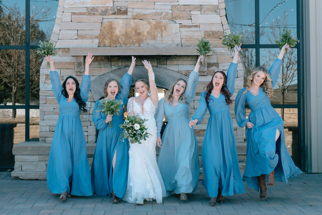 blue bridesmaids dresses with green wedding bouquets