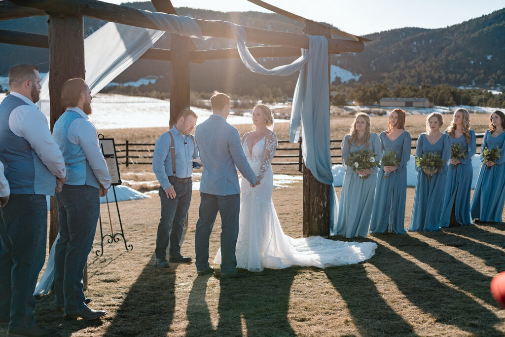 Spruce Mountain Ranch Wedding ceremony outdoors golden hour