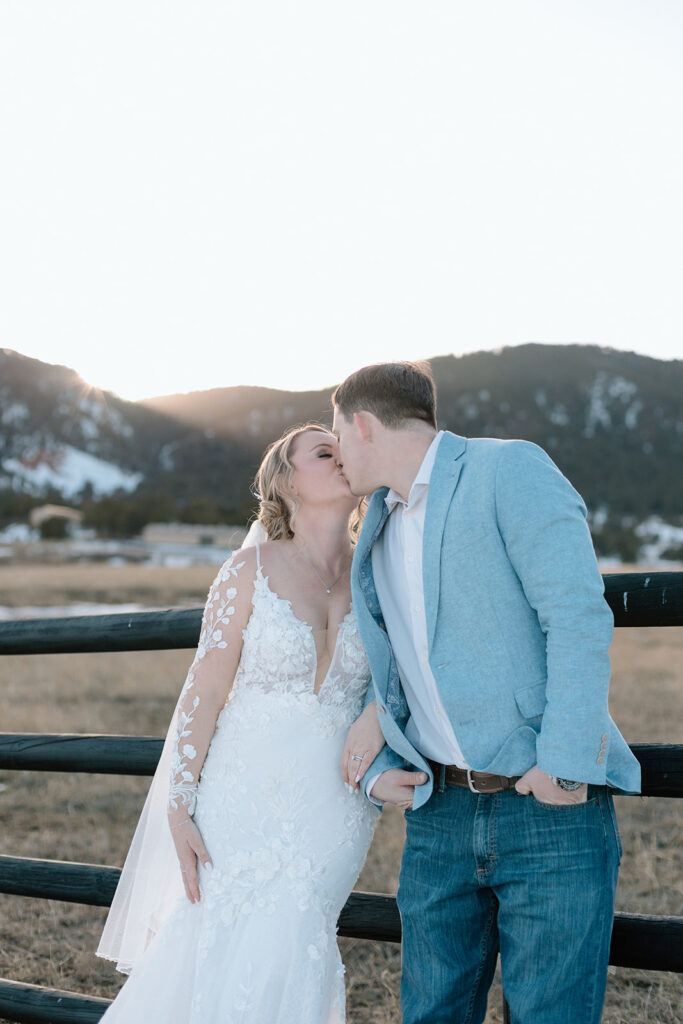 bride and groom kissing Colorado Springs wedding