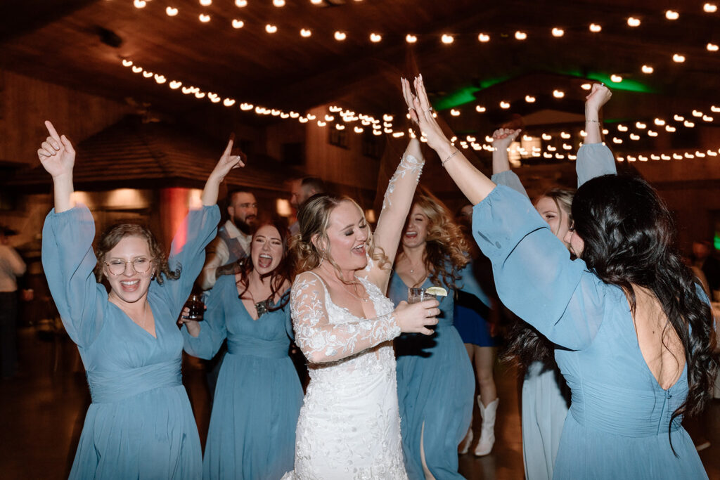 wedding guests dancing at reception in colorado