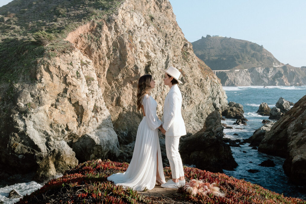 lgbtq elopement couple holding hands in big sur