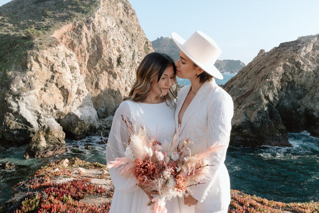 playful california beach elopement photos on the cliffs