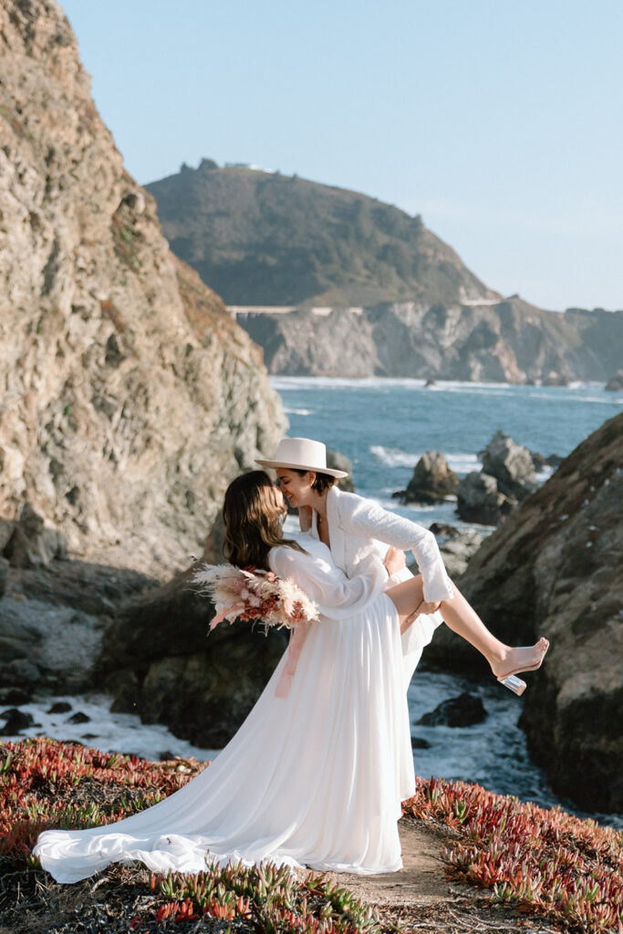 dip kiss pose during adventurous elopement