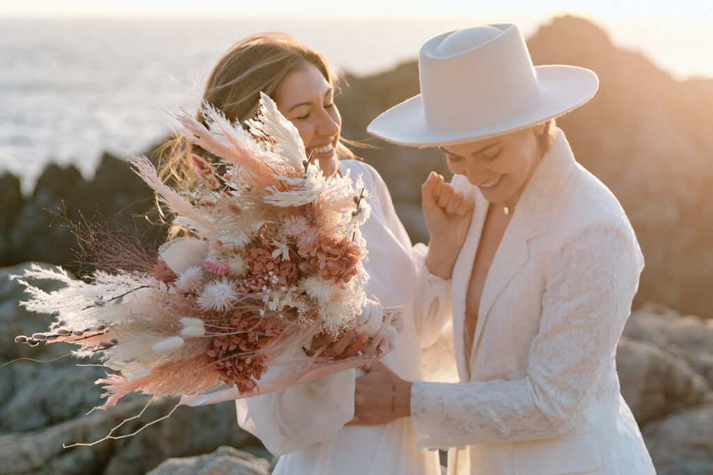 lgbtq couple smiling and laughing during destination elopement