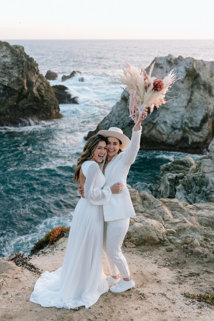 couple celebrating elopement lgbtq wedding