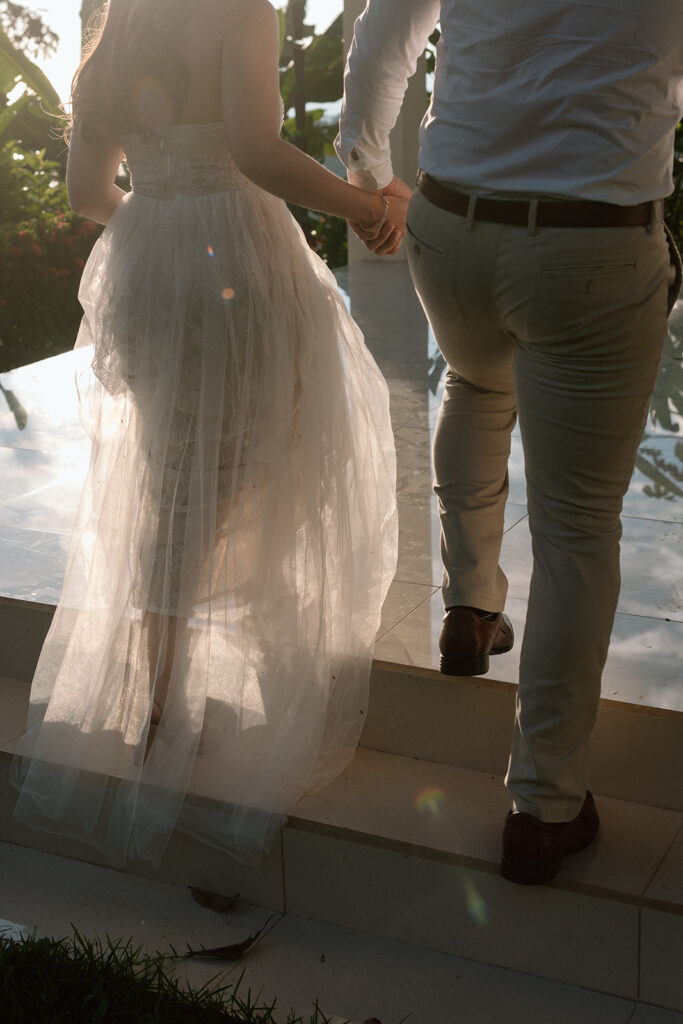 bride and groom walking photos detail wedding photos holding hands