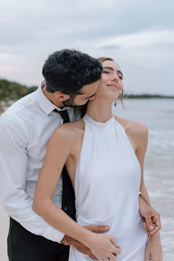 bride and groom portraits in tulum mexico on the beach