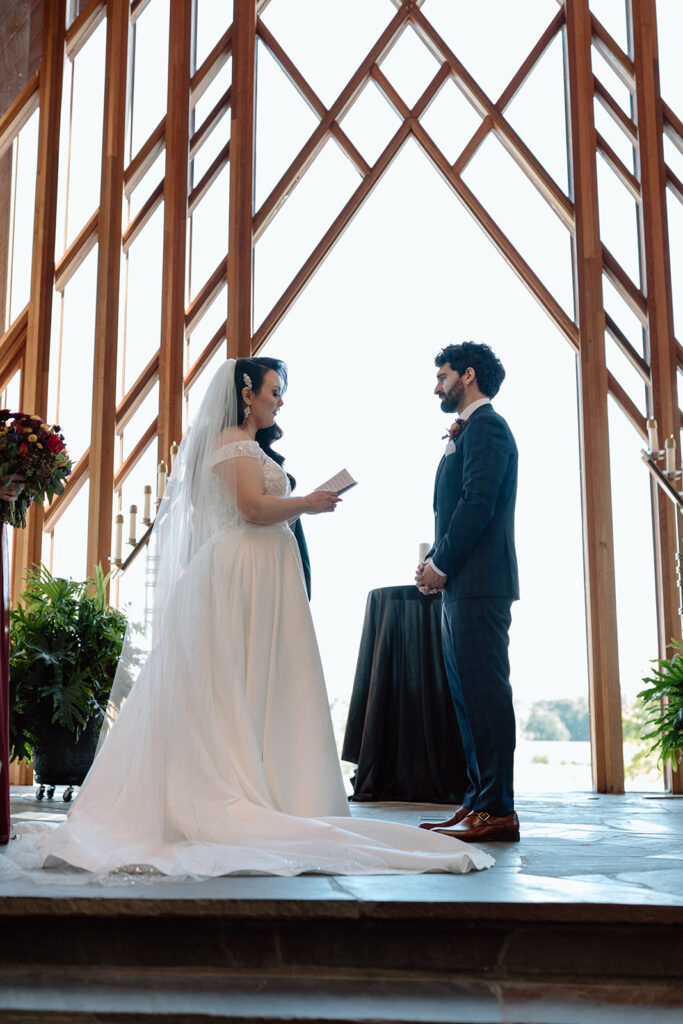 bride and groom exchanging vows