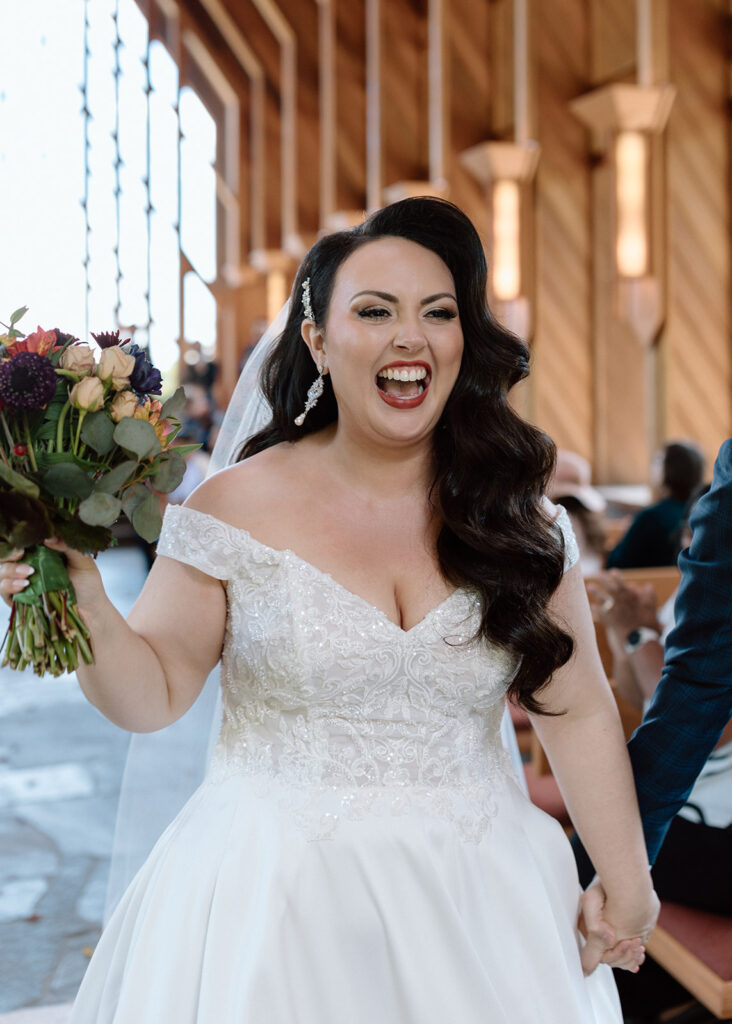 bride smiling after wedding ceremony