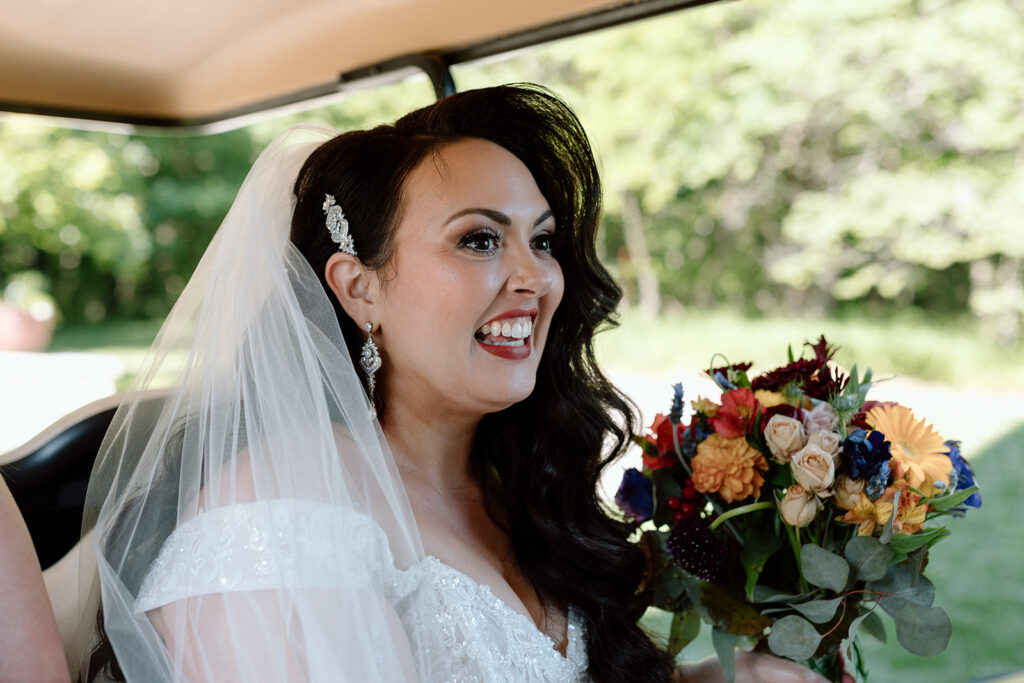 bride smiling after ceremony