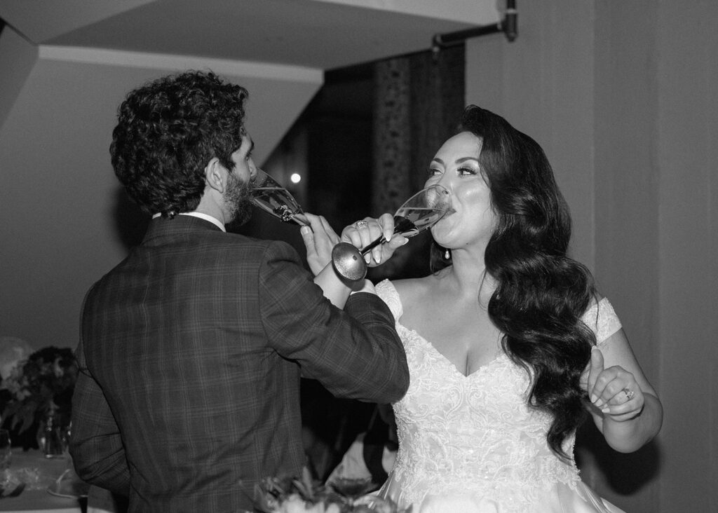 bride and groom cutting the cake