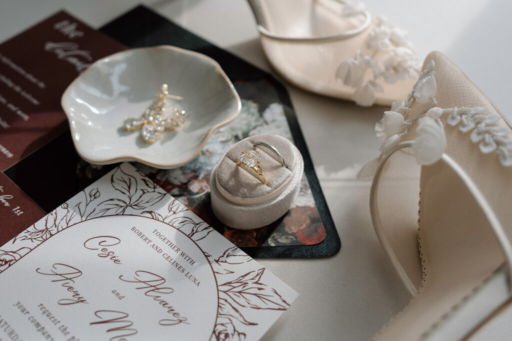 Jewelry from Anne Marie Designs, wedding stationary from The Suite Studio, and bridal shoes from Bella Belle.