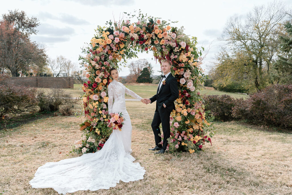 A Longview Mansion wedding styled shoot with a Floriography KC floral arch and bouquet.