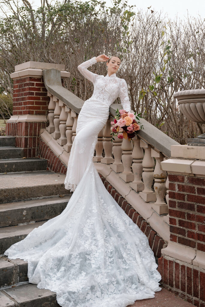Taylor poses for bridal portraits during the styled wedding at Longview Mansion.