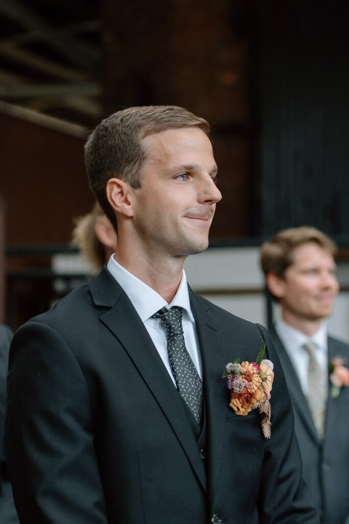 the groom's first look as the bride walks down the aisle