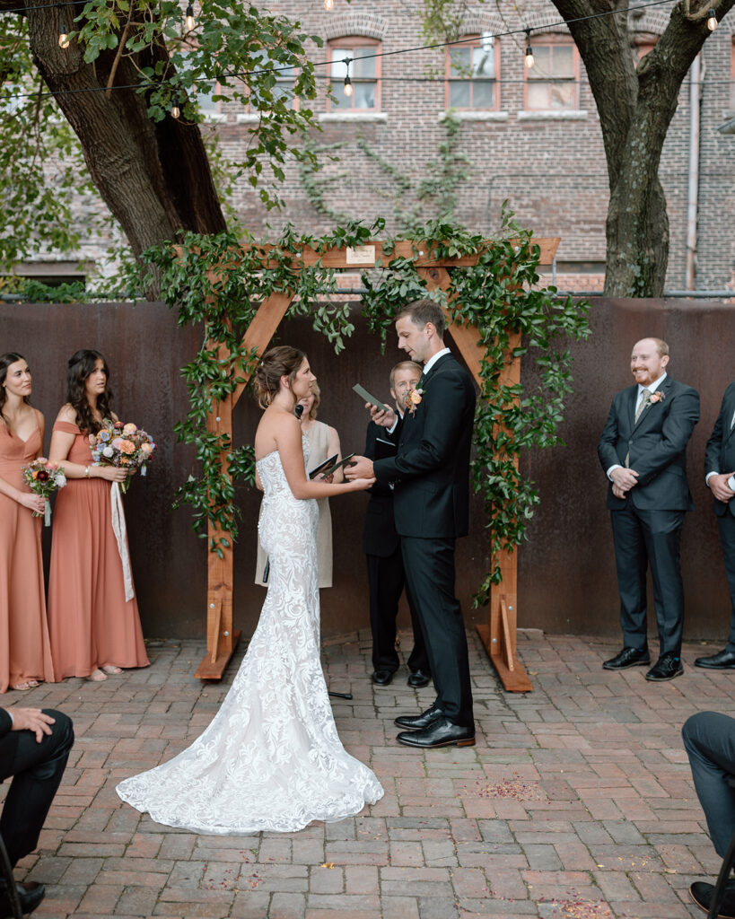 the bride and groom exchange vows 