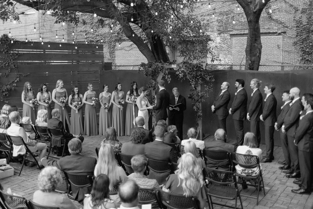 wedding ceremony pictures in the courtyard at The Hobbs wedding venue