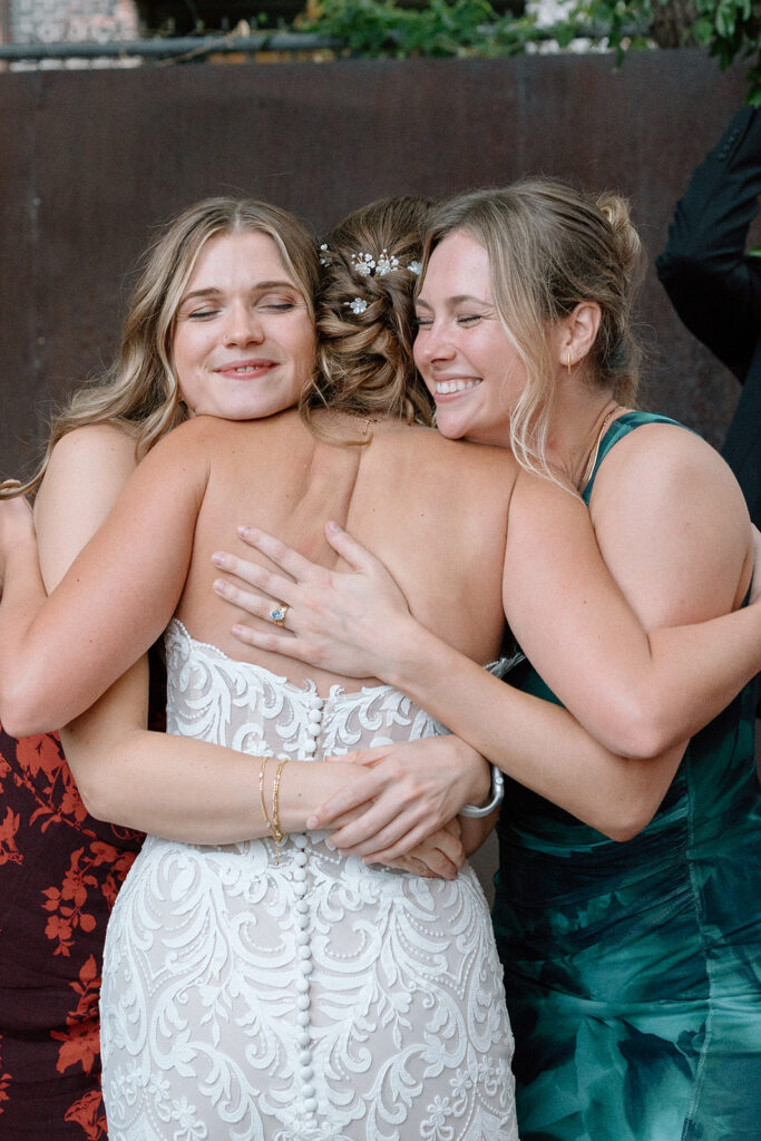 the bride and guests celebrating the wedding at The Hobbs in the West Bottoms