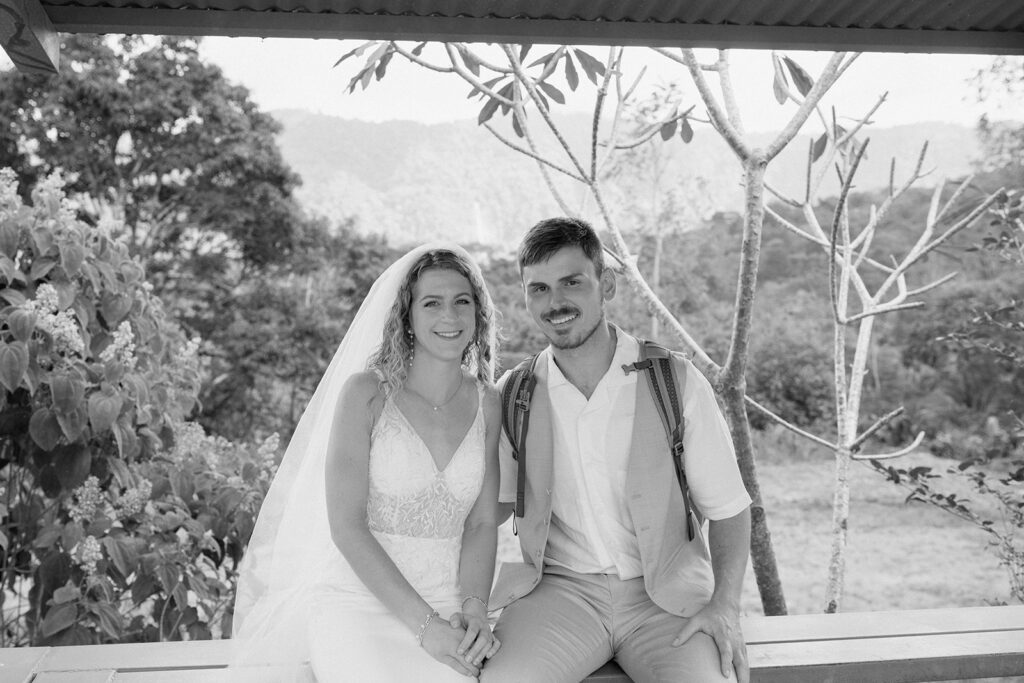 Bride and groom posed photo beforethe hike to the waterfall elopement ceremony.