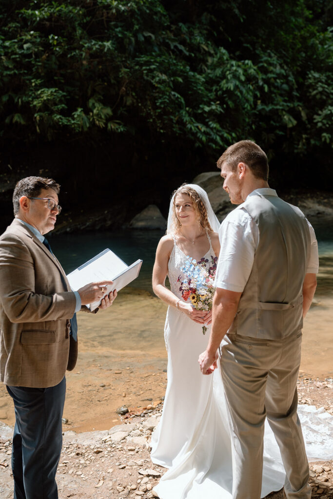 romantic wedding pictures of a couple eloping at Nauyaca Waterfalls
