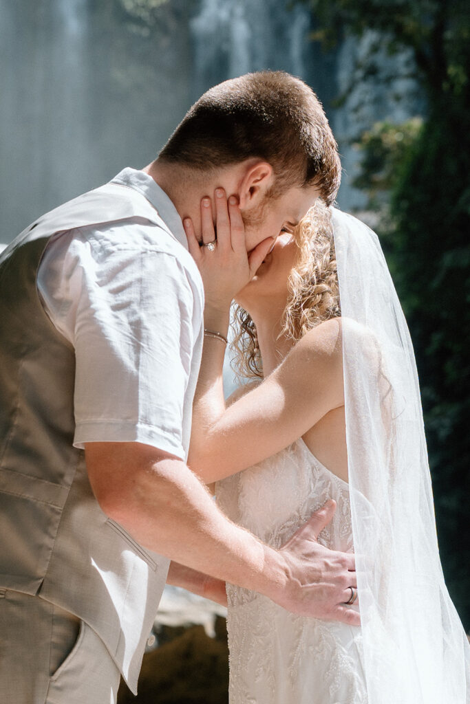 The elopement day first kiss.