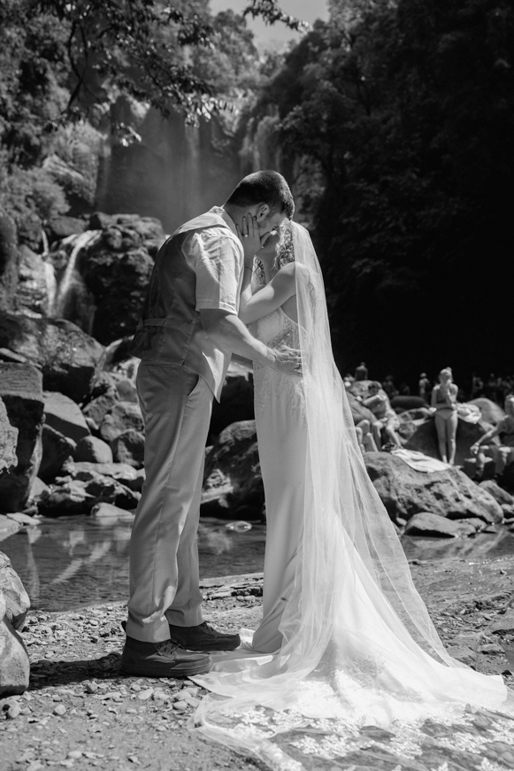 Black and white gif of the wedding day first kiss.