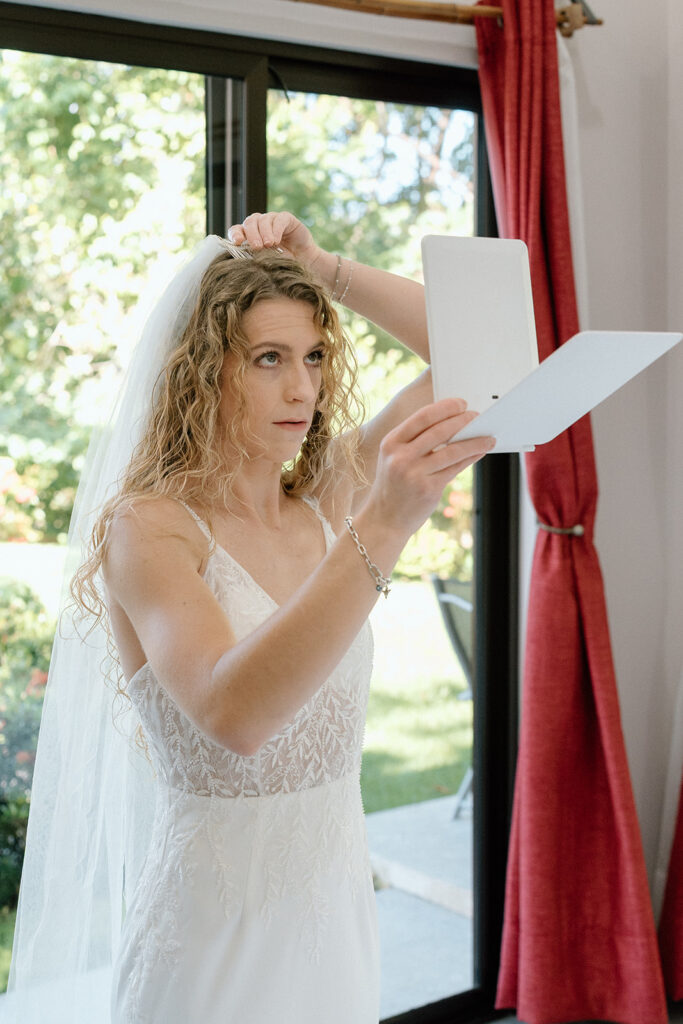 The bride getting ready for bridal portraits.