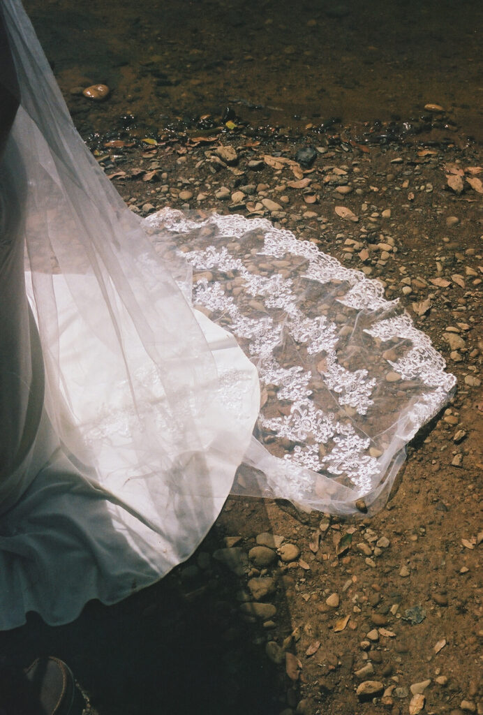 wedding pictures on 35mm film of a couple eloping at Nauyaca Waterfalls 
